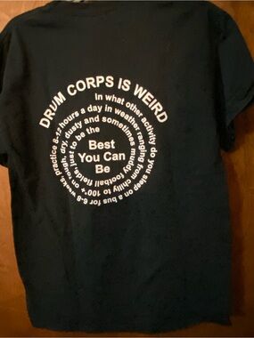 Medium tee with  "Drum Corps Is Weird" in black with White Print on back